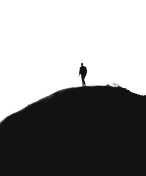 a man walking on the mountain